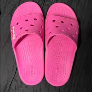 pink croc slides.